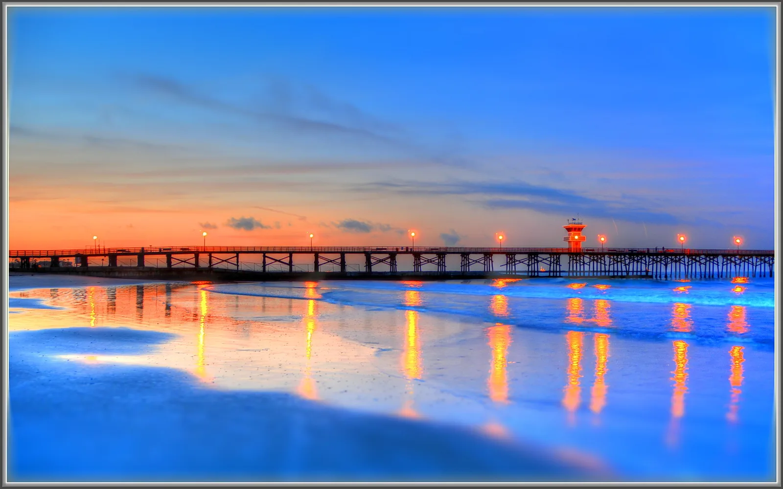The Seal Beach Pier extending over the Pacific Ocean, a community gathering place